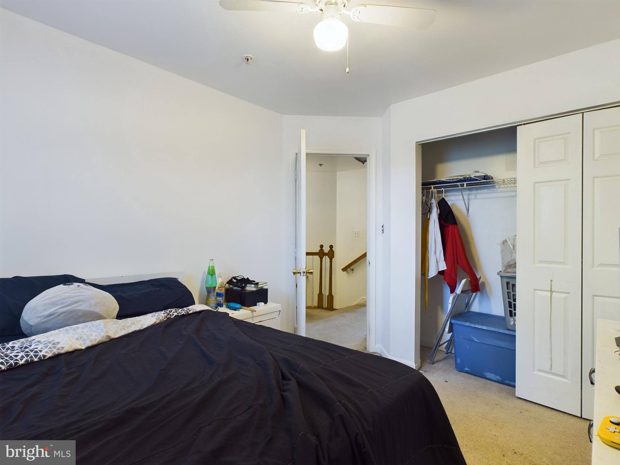 9620 Button Buck Circle Randallstown, MD 21133 - Photo 13 of 32 a bedroom with a bed and a closet