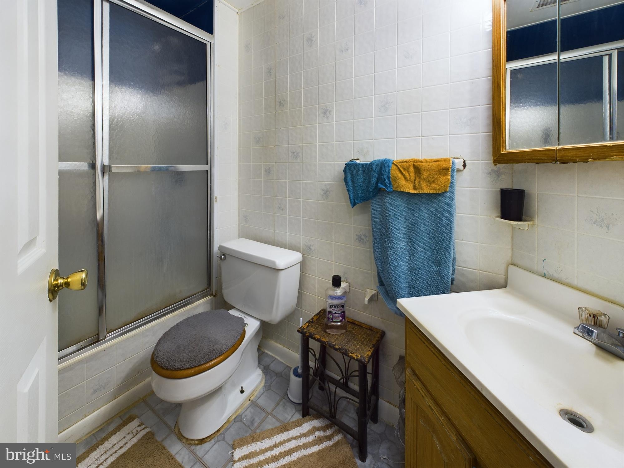 9620 Button Buck Circle Randallstown, MD 21133 - Photo 20 of 32 a bathroom with a toilet and a sink