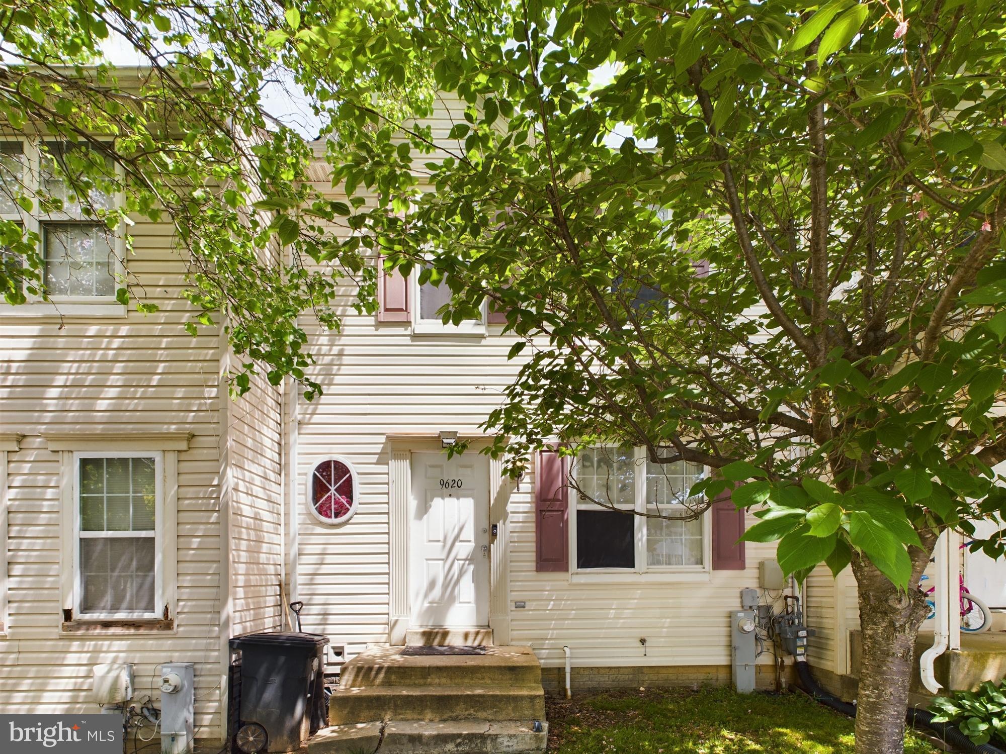 9620 Button Buck Circle Randallstown, MD 21133 - Photo 2 of 32 a front view of a house with plants