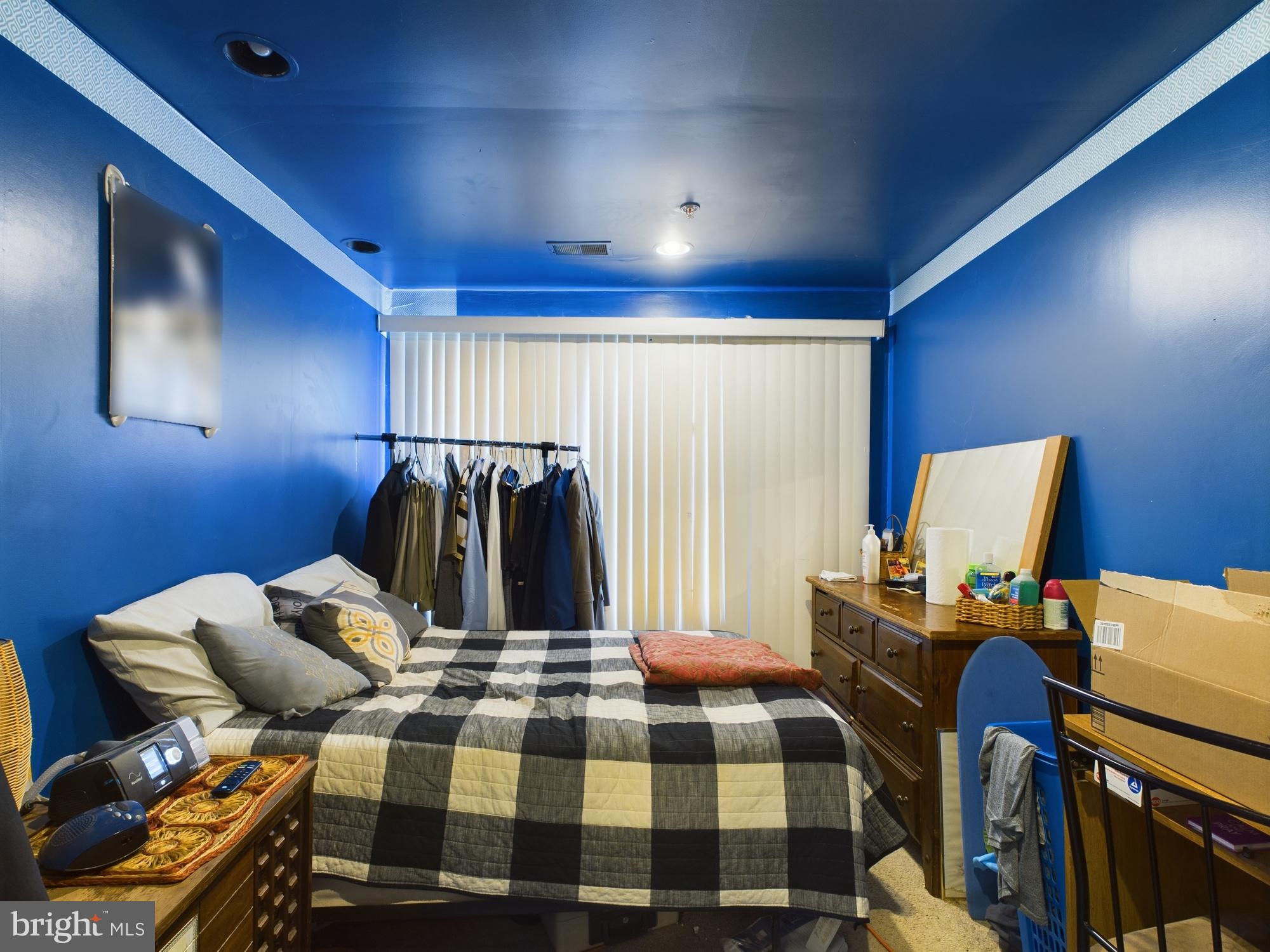 9620 Button Buck Circle Randallstown, MD 21133 - Photo 22 of 32 a room with furniture and a projector