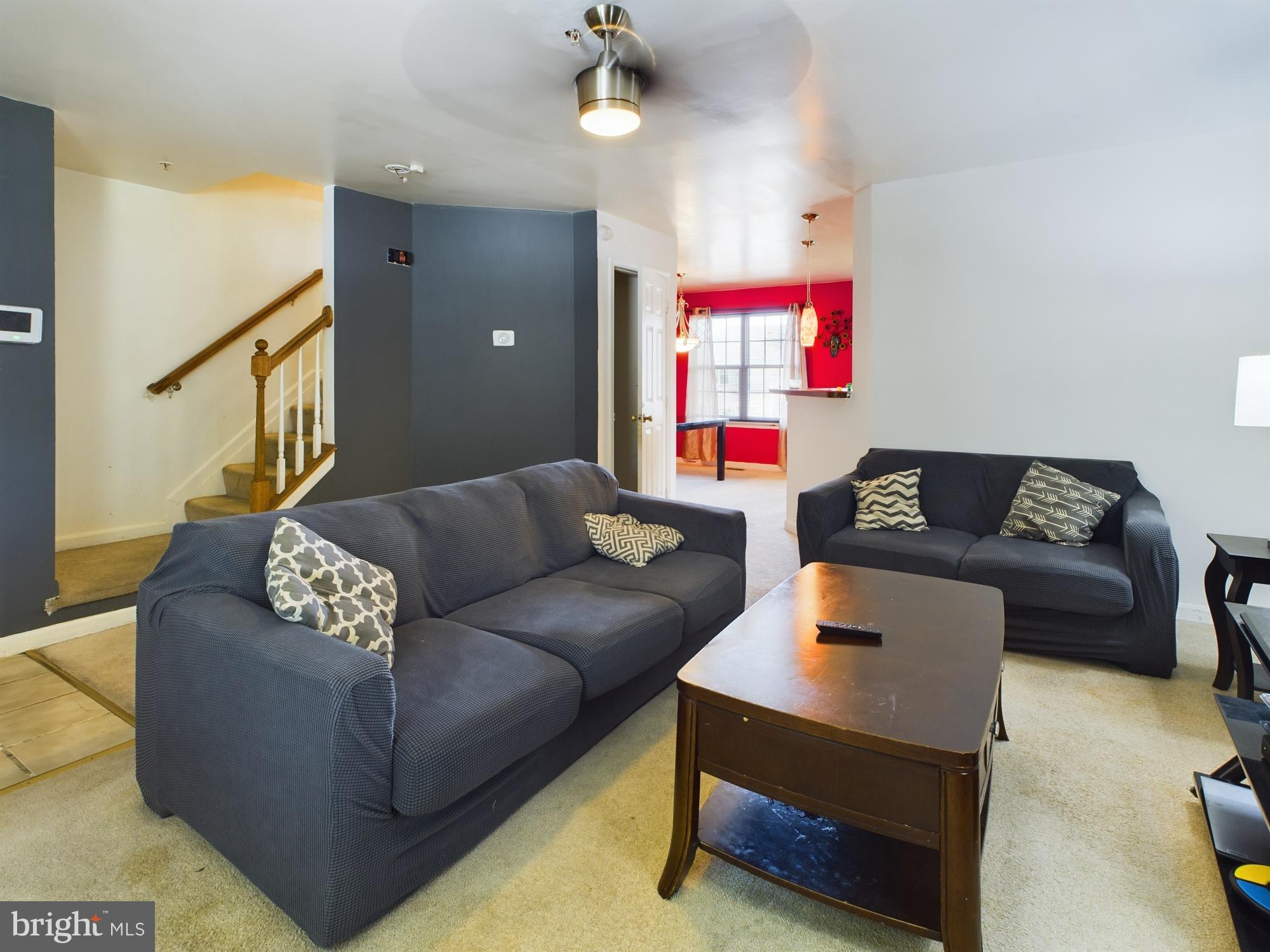 9620 Button Buck Circle Randallstown, MD 21133 - Photo 5 of 32 a living room with furniture and a couch