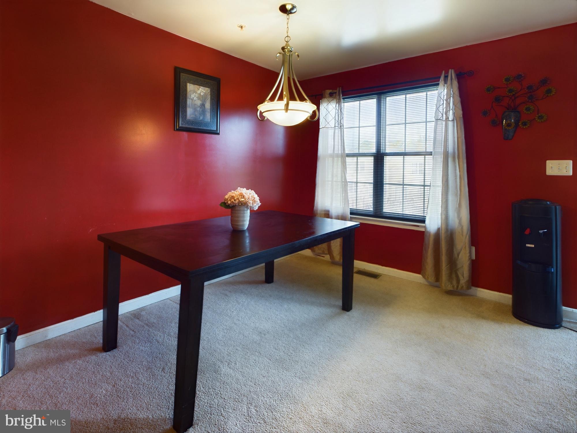 9620 Button Buck Circle Randallstown, MD 21133 - Photo 6 of 32 a room with furniture and window