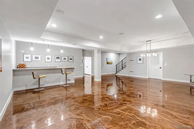 a view of a kitchen with furniture and a kitchen