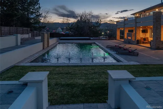 a view of a backyard with a tub