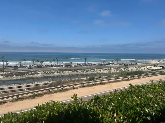 a view of a city with ocean