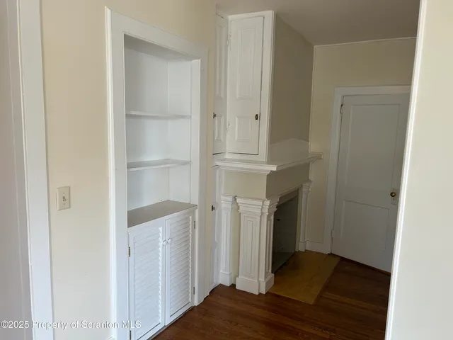 a bathroom with a toilet and a sink