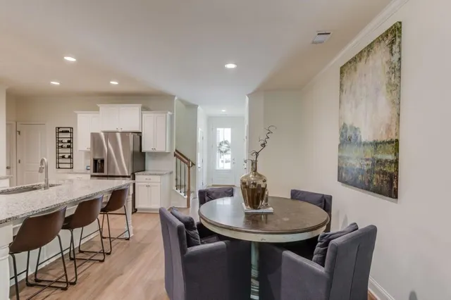 a view of a door and chair in a room