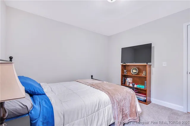 a view of a swimming pool with an outdoor space and seating area