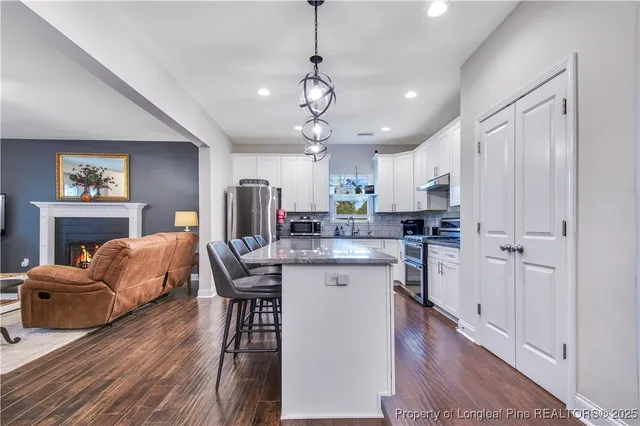 a bathroom with a shower and a toilet