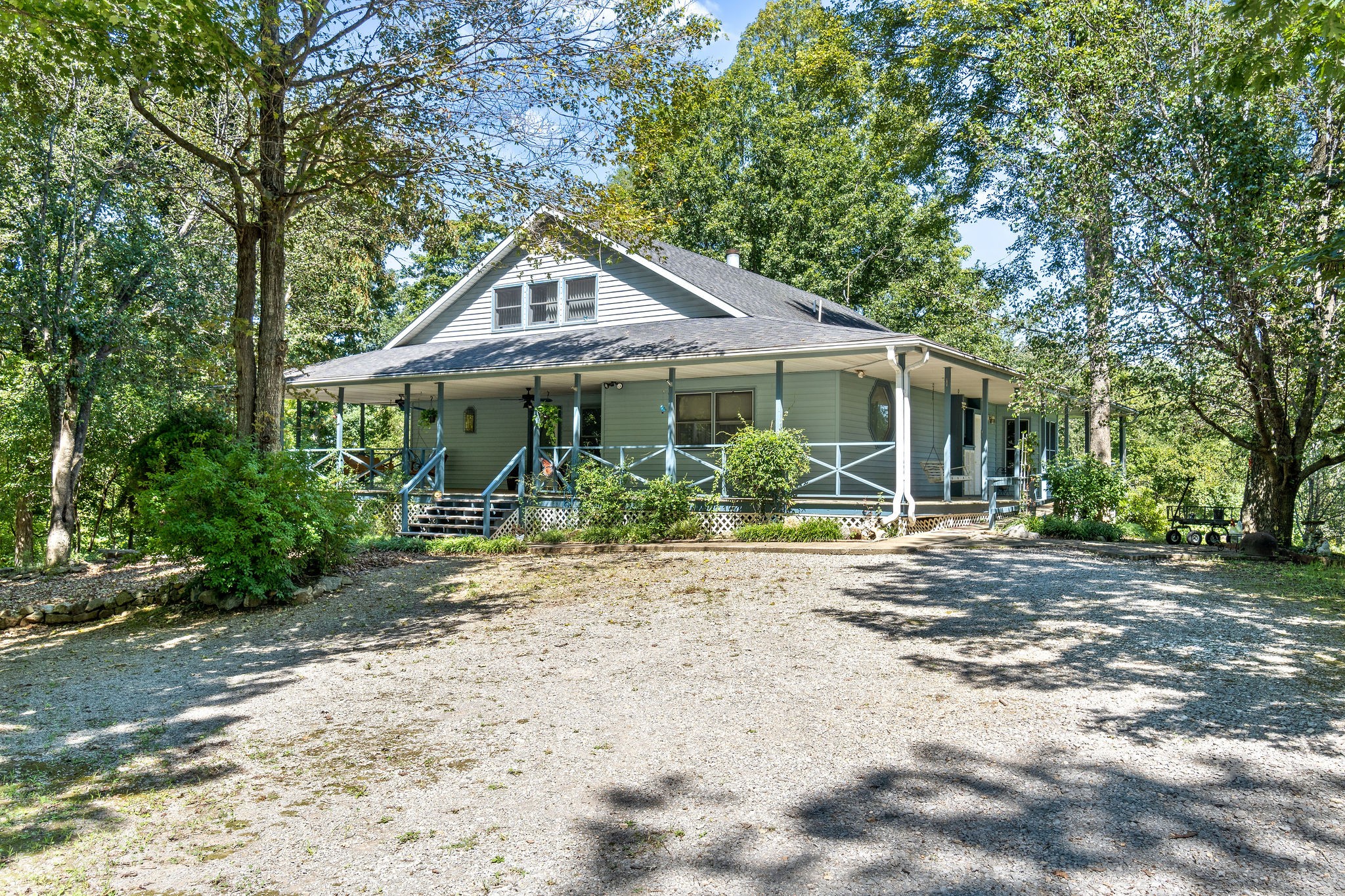 3250 Luther Ragan Road Palmyra, TN 37142 - Photo 2 of 44 a front view of a house with garden