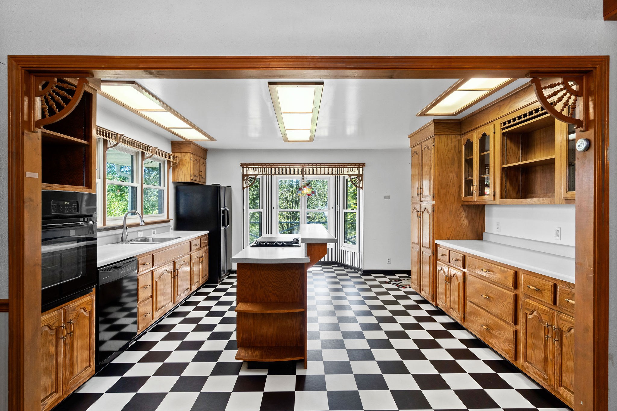 3250 Luther Ragan Road Palmyra, TN 37142 - Photo 13 of 44 a kitchen with granite countertop stainless steel appliances a stove a sink and a window