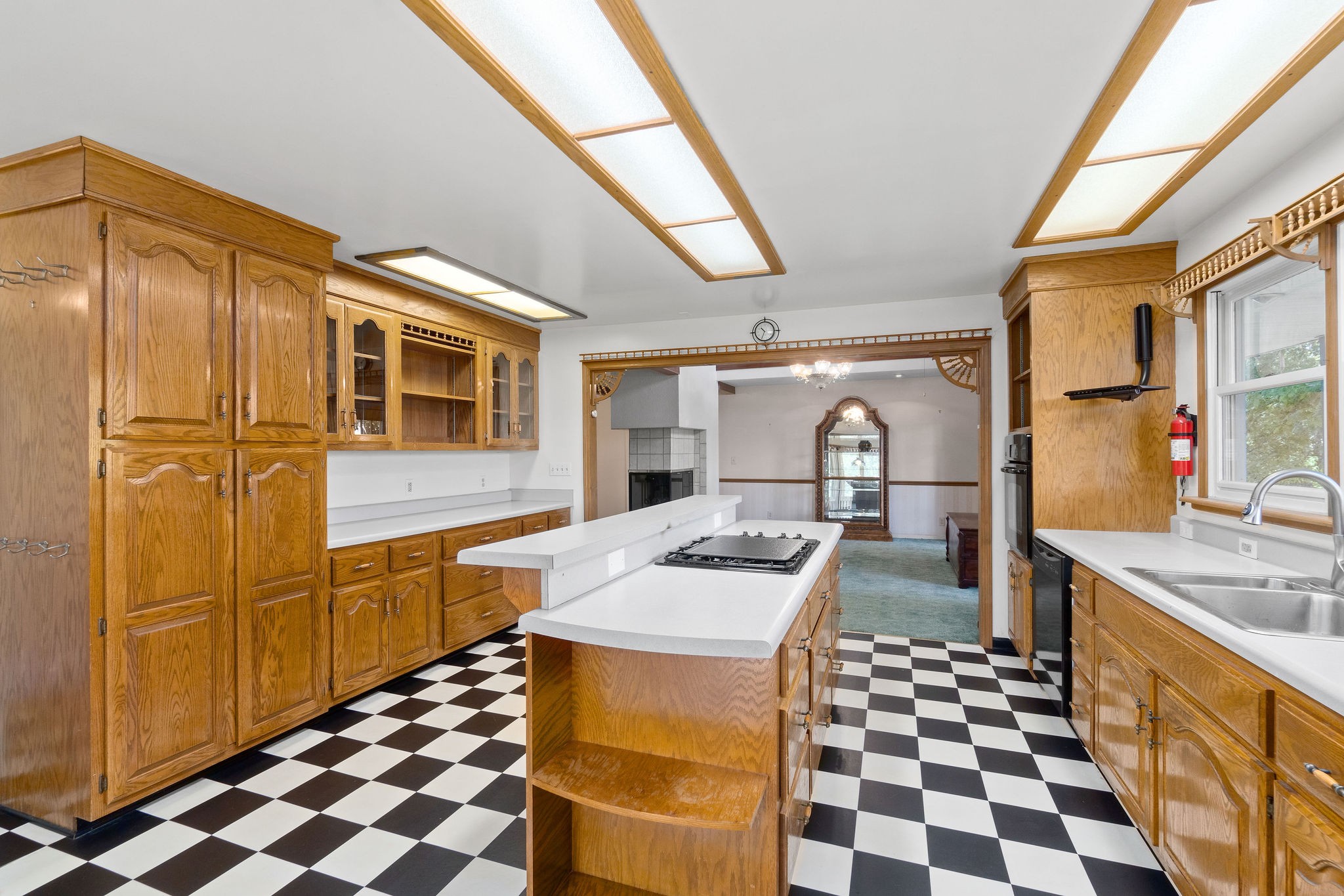 3250 Luther Ragan Road Palmyra, TN 37142 - Photo 16 of 44 a kitchen with granite countertop stainless steel appliances a stove a sink and a refrigerator