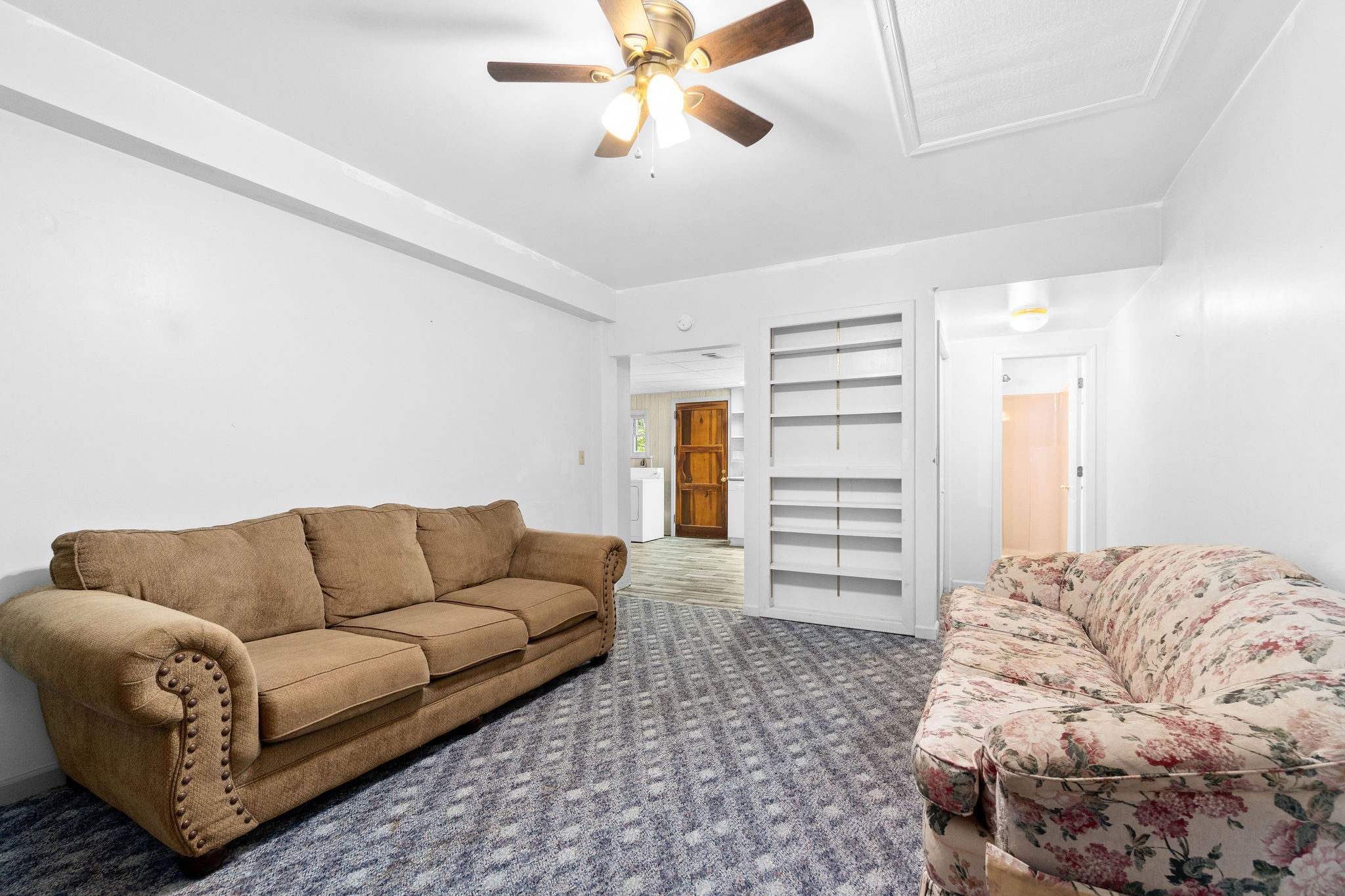 3250 Luther Ragan Road Palmyra, TN 37142 - Photo 27 of 44 a living room with furniture and a couch