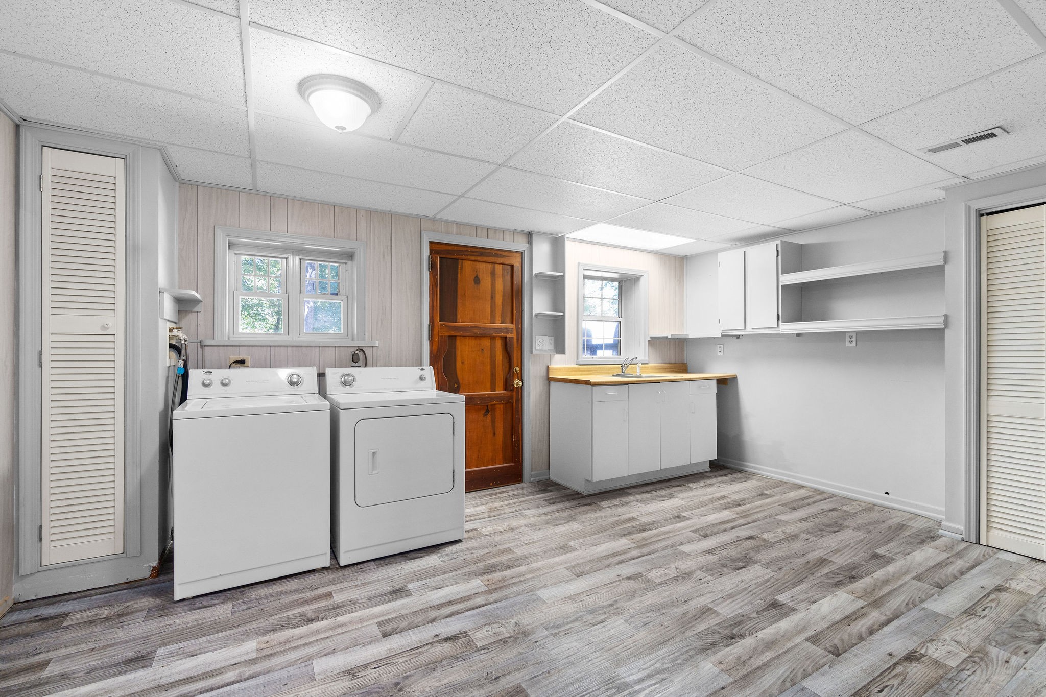 3250 Luther Ragan Road Palmyra, TN 37142 - Photo 30 of 44 a view of kitchen with wooden floor and sink