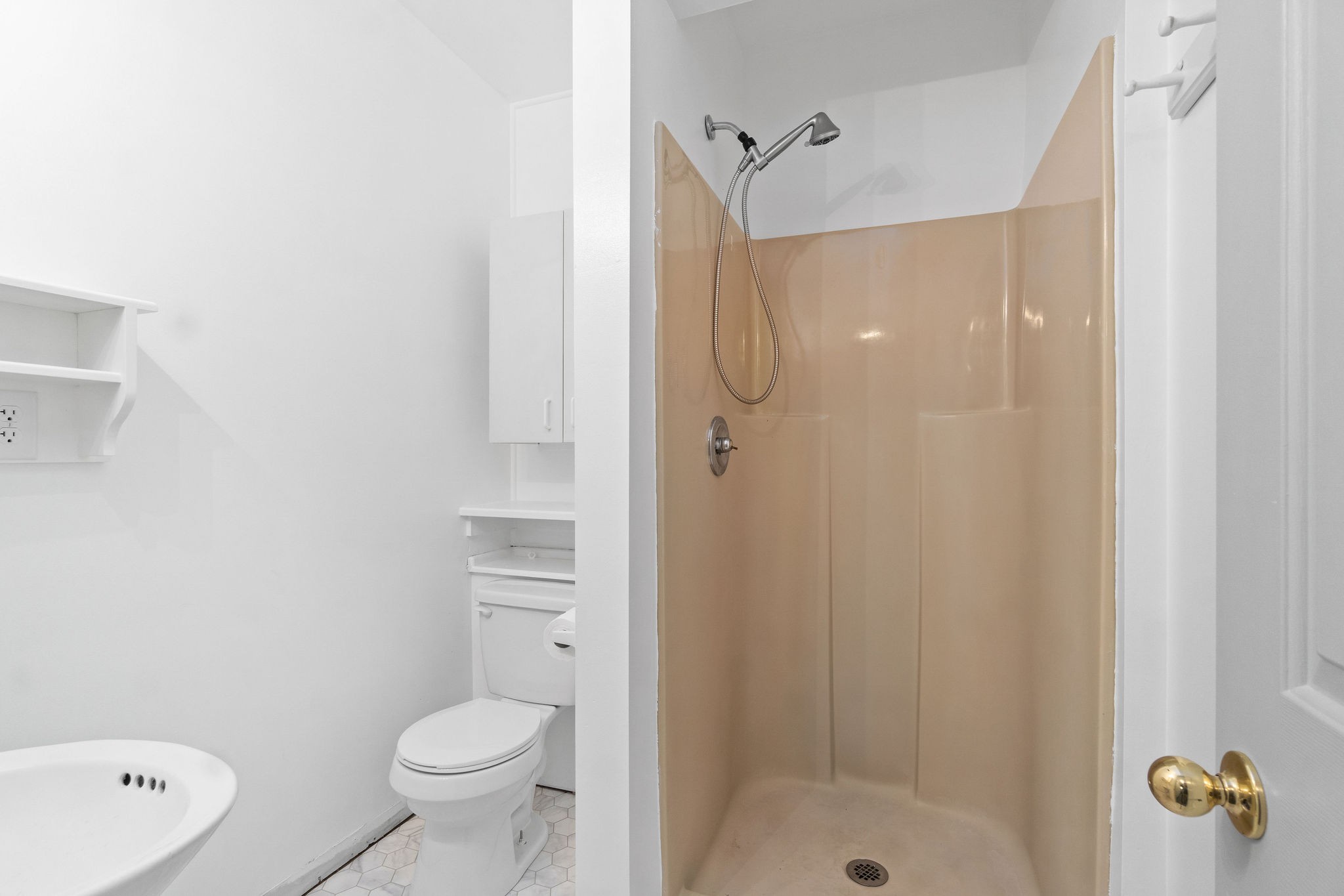 3250 Luther Ragan Road Palmyra, TN 37142 - Photo 32 of 44 a bathroom with a shower a toilet and a sink