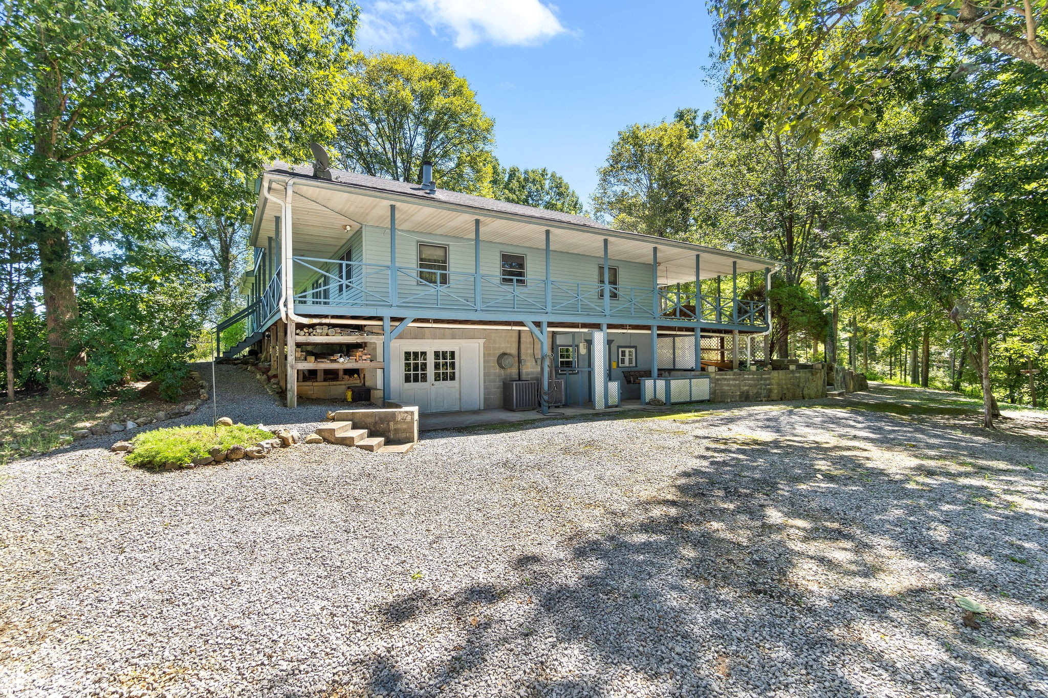 3250 Luther Ragan Road Palmyra, TN 37142 - Photo 36 of 44 a front view of a house with a yard