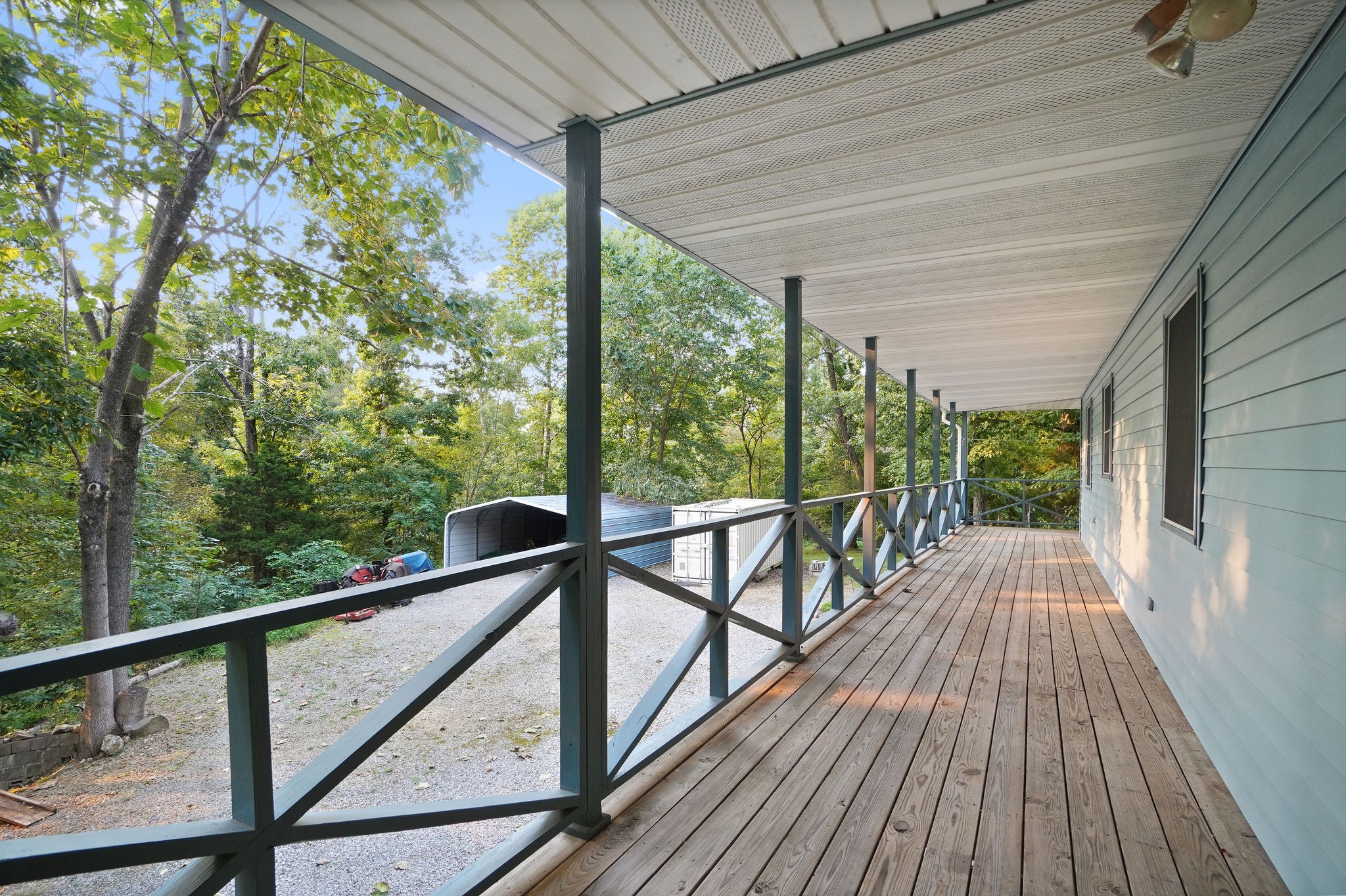 3250 Luther Ragan Road Palmyra, TN 37142 - Photo 40 of 44 a view of balcony with wooden floor
