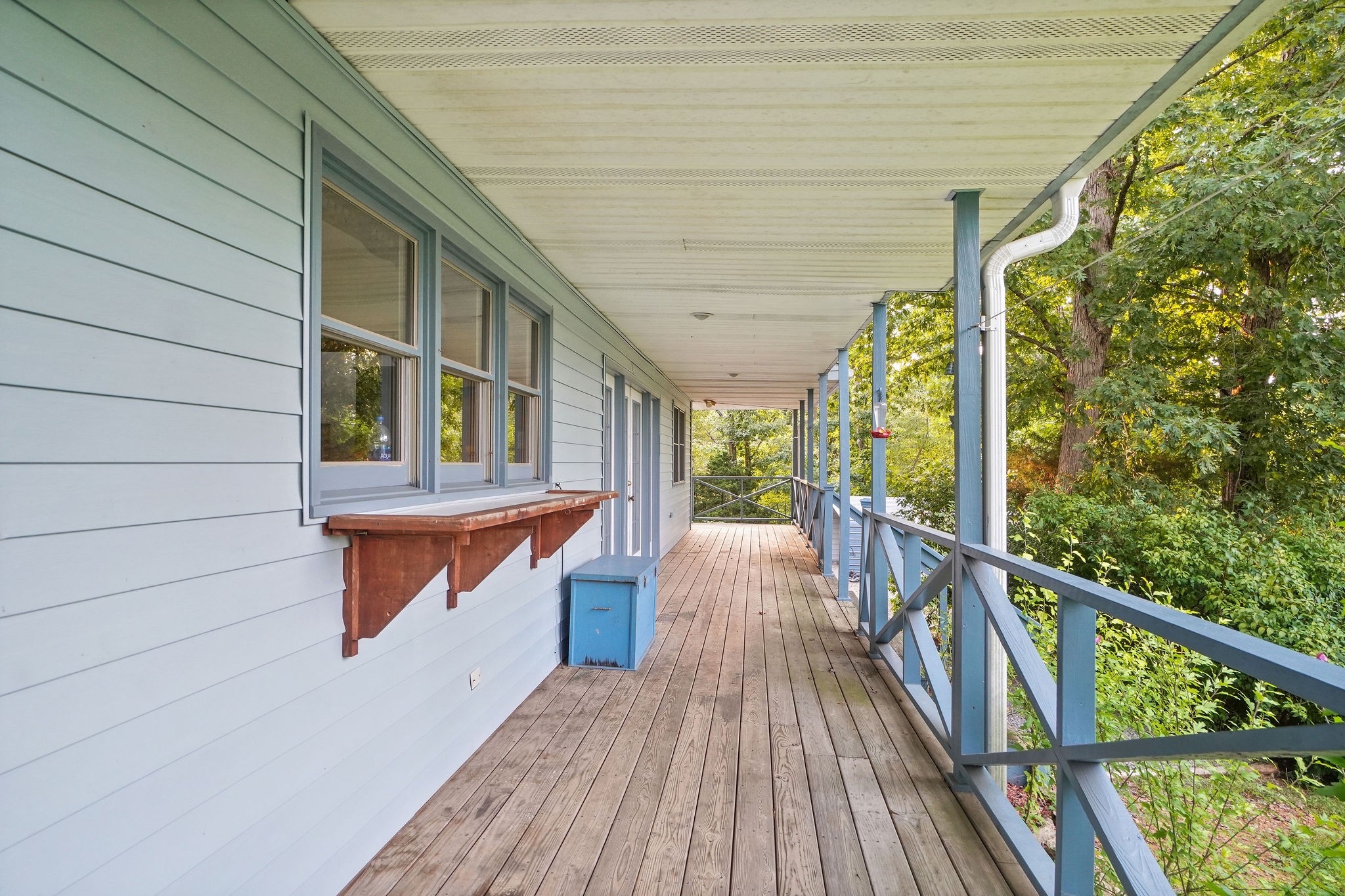 3250 Luther Ragan Road Palmyra, TN 37142 - Photo 42 of 44 a balcony with wooden floor and outdoor seating