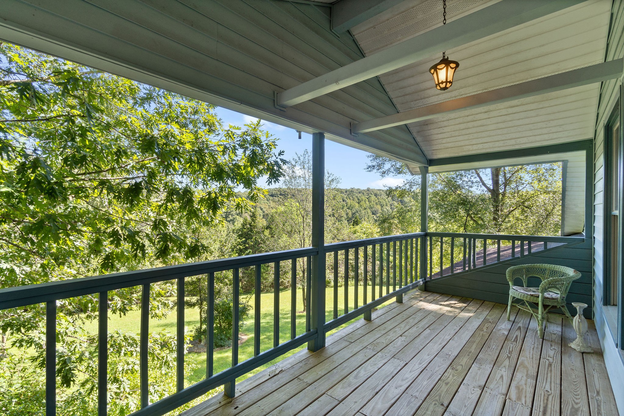 3250 Luther Ragan Road Palmyra, TN 37142 - Photo 43 of 44 a view of a balcony with wooden floor