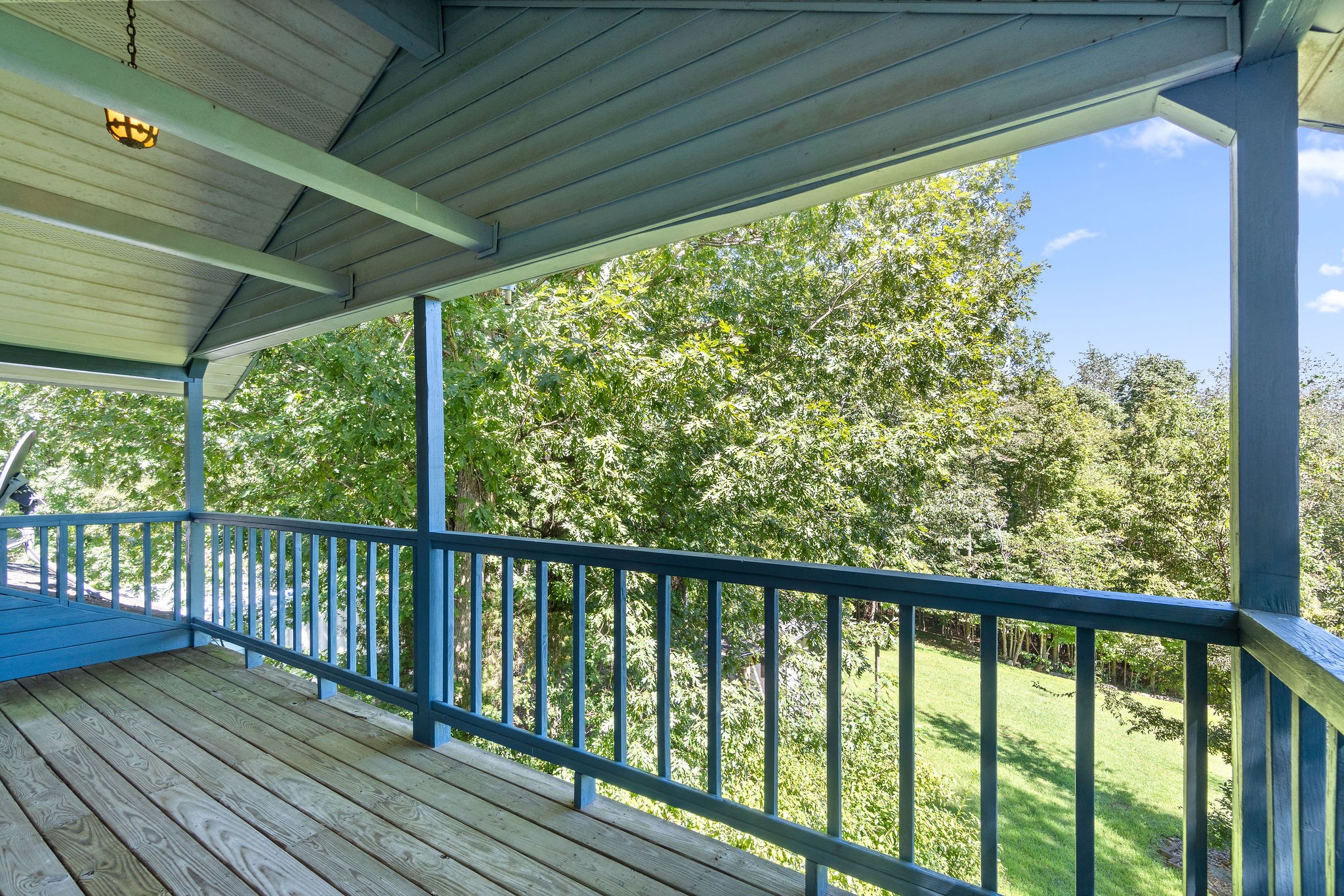 3250 Luther Ragan Road Palmyra, TN 37142 - Photo 44 of 44 a view of a balcony with wooden floor