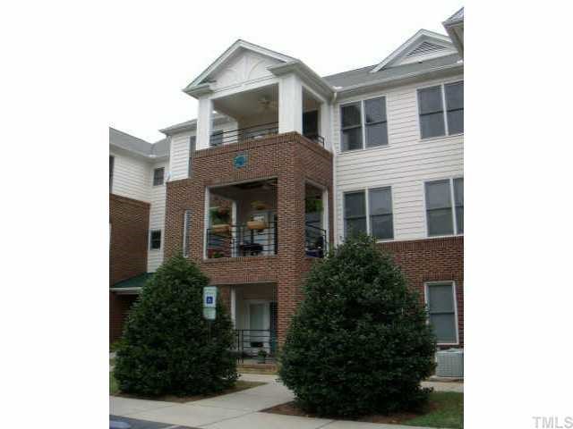 720 North Person Street, Unit 105 Raleigh, NC 27604 - Photo 1 of 8 a front view of a house with garden