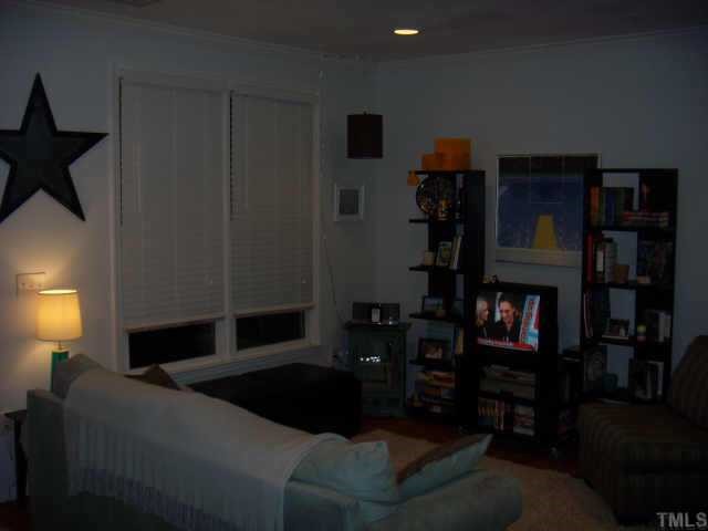 720 North Person Street, Unit 105 Raleigh, NC 27604 - Photo 4 of 8 a living room with furniture