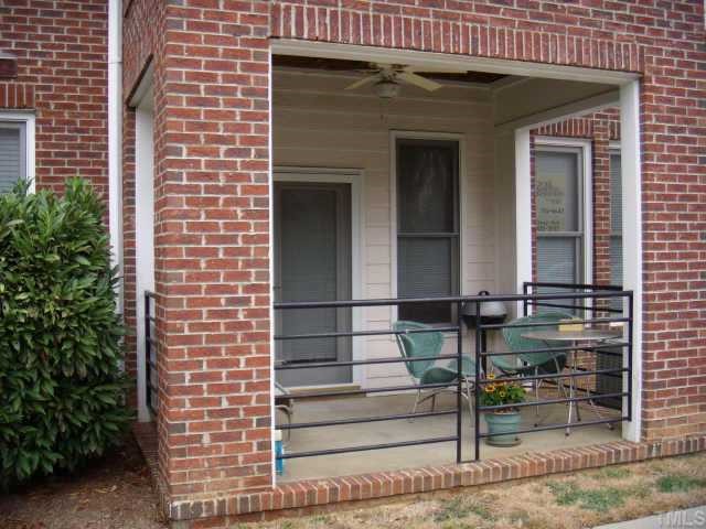 720 North Person Street, Unit 105 Raleigh, NC 27604 - Photo 8 of 8 a front view of a house with stairs