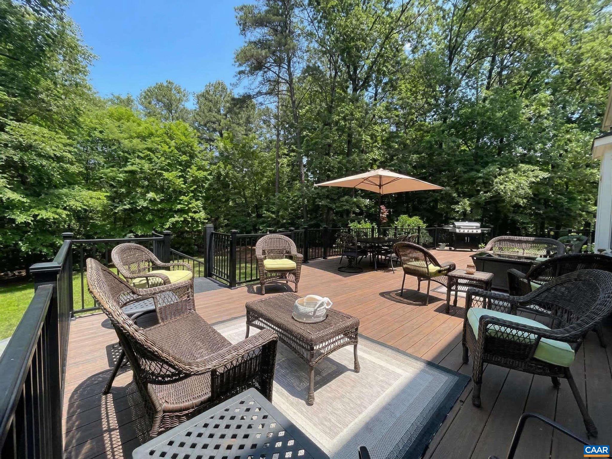 4605 Blue Run Road Somerset, VA 22972 - Photo 35 of 56 a backyard of a house with wooden floor yard fire pit and outdoor seating