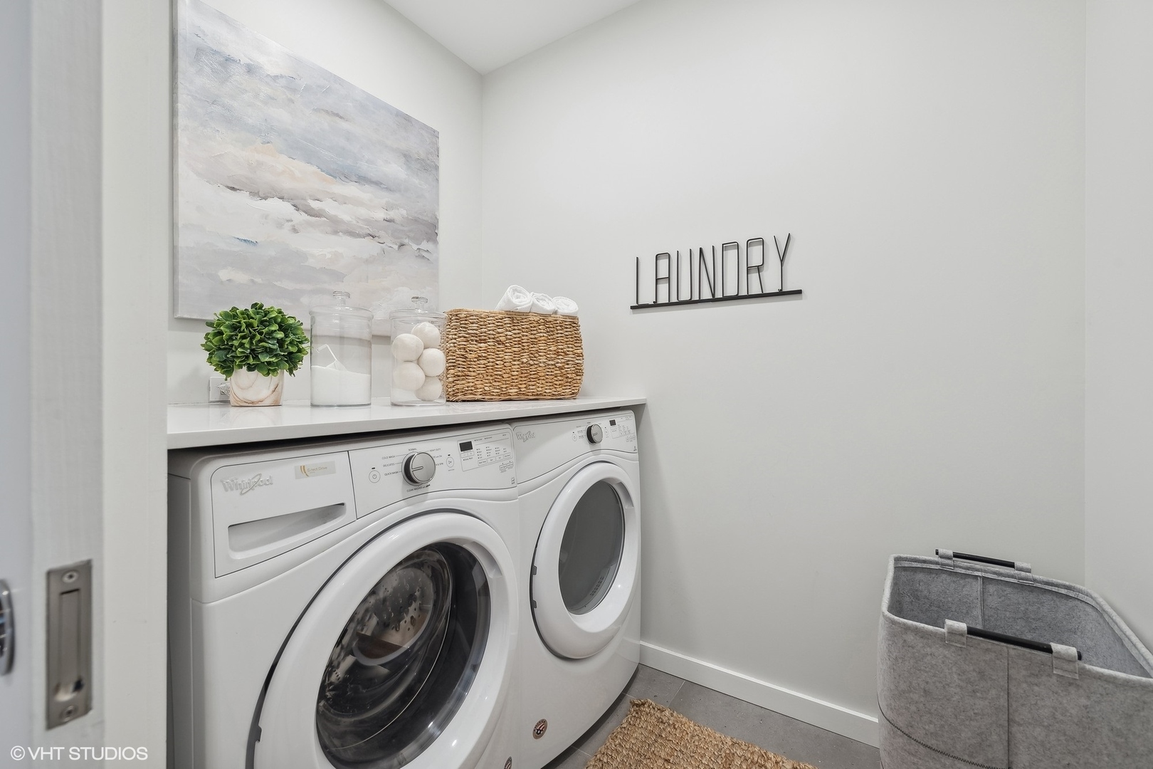 56 West Huron Street, Unit 6 Chicago, IL 60654 - Photo 22 of 32 a utility room with dryer and washer