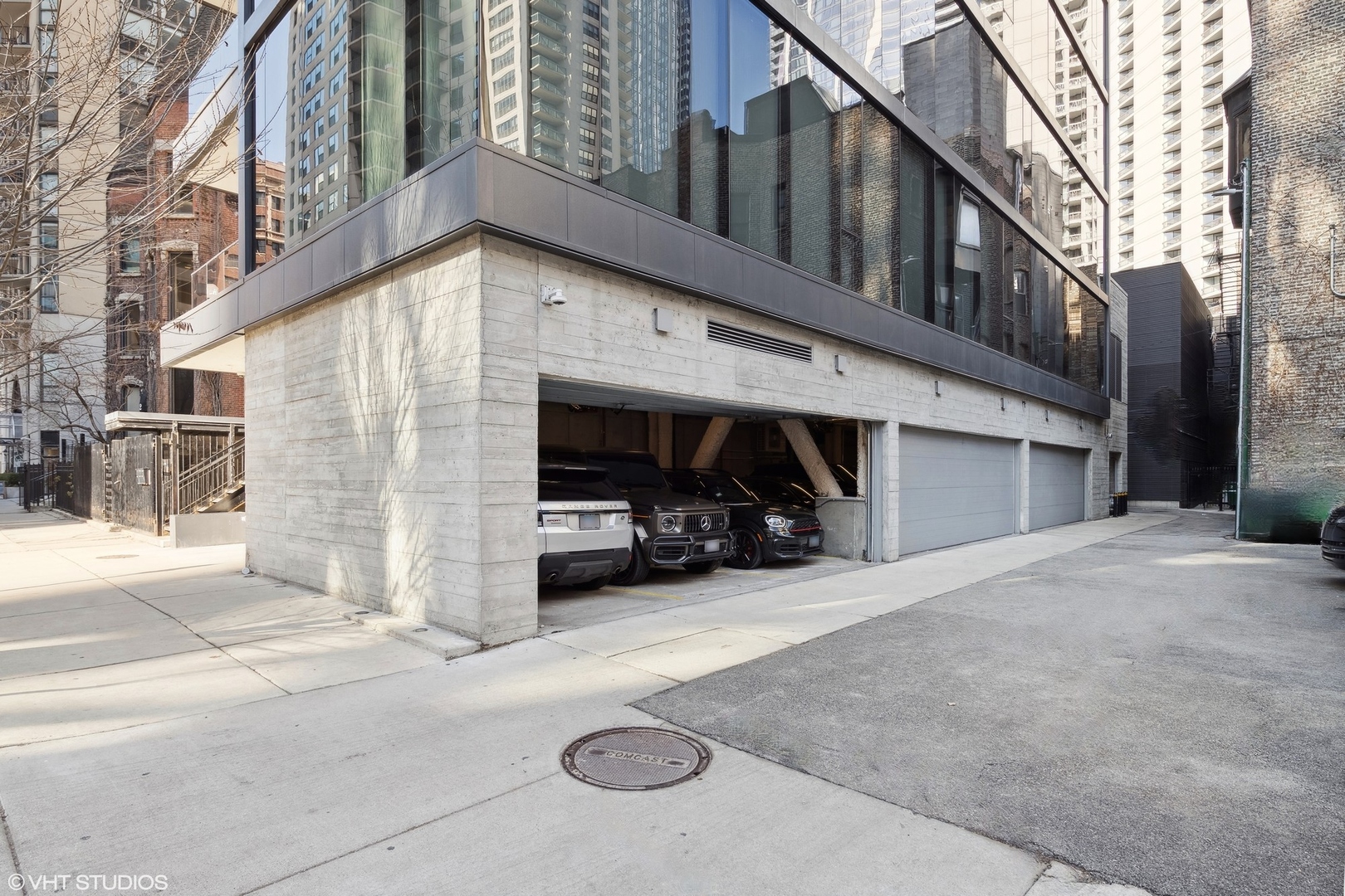 56 West Huron Street, Unit 6 Chicago, IL 60654 - Photo 31 of 32 a view of a car park in front of house