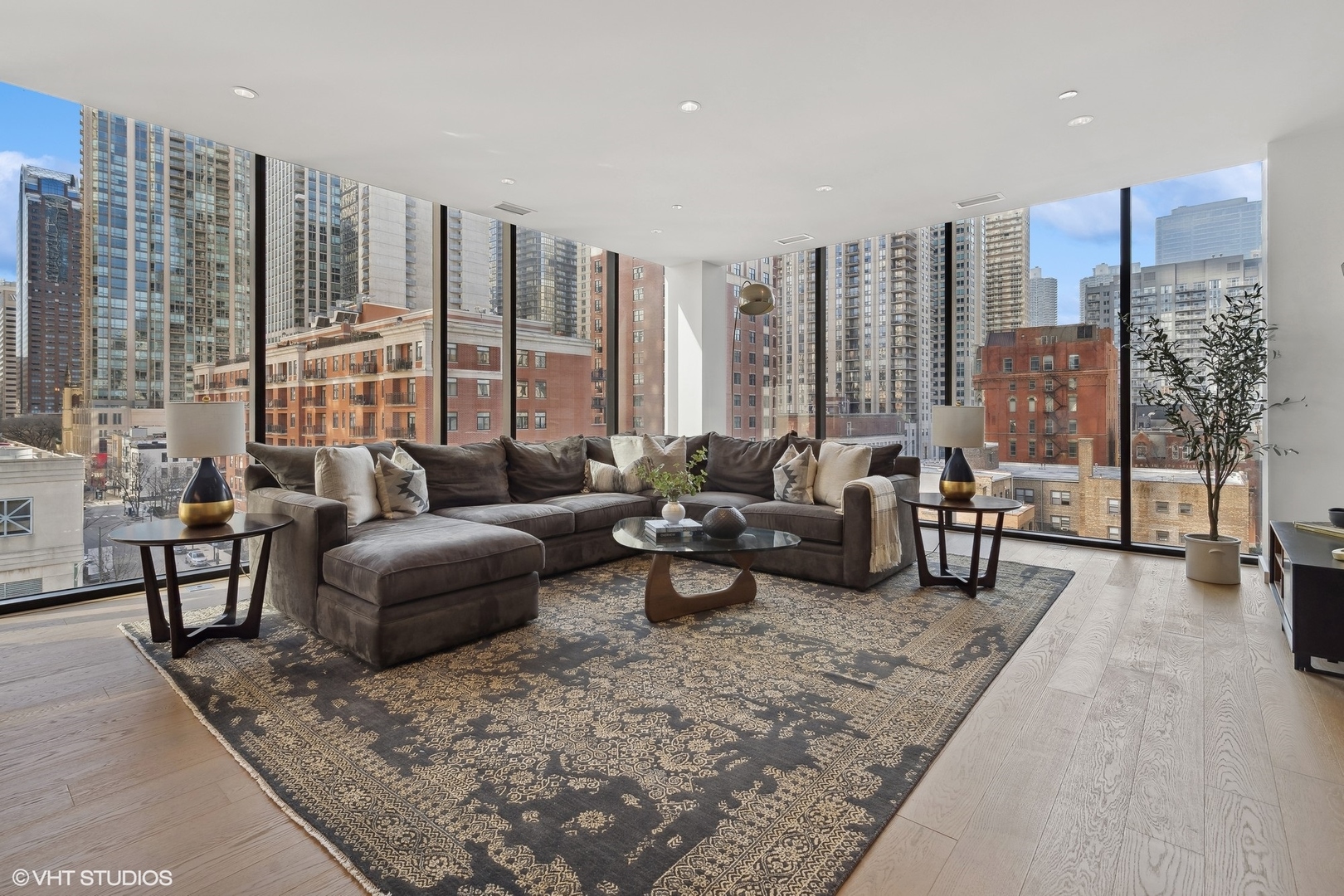 56 West Huron Street, Unit 6 Chicago, IL 60654 - Photo 4 of 32 a living room with furniture and a large window