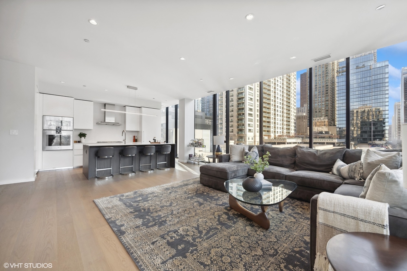 56 West Huron Street, Unit 6 Chicago, IL 60654 - Photo 5 of 32 a living room with furniture and a large window