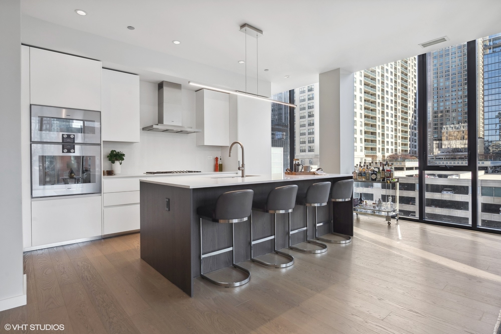 56 West Huron Street, Unit 6 Chicago, IL 60654 - Photo 7 of 32 a kitchen with a sink a counter top space and appliances