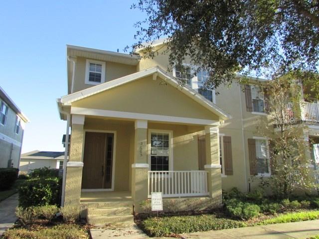 3605 Clay Brick Road, Unit 54B St. Cloud, FL 34773 - Photo 1 of 1 a front view of a house with garden