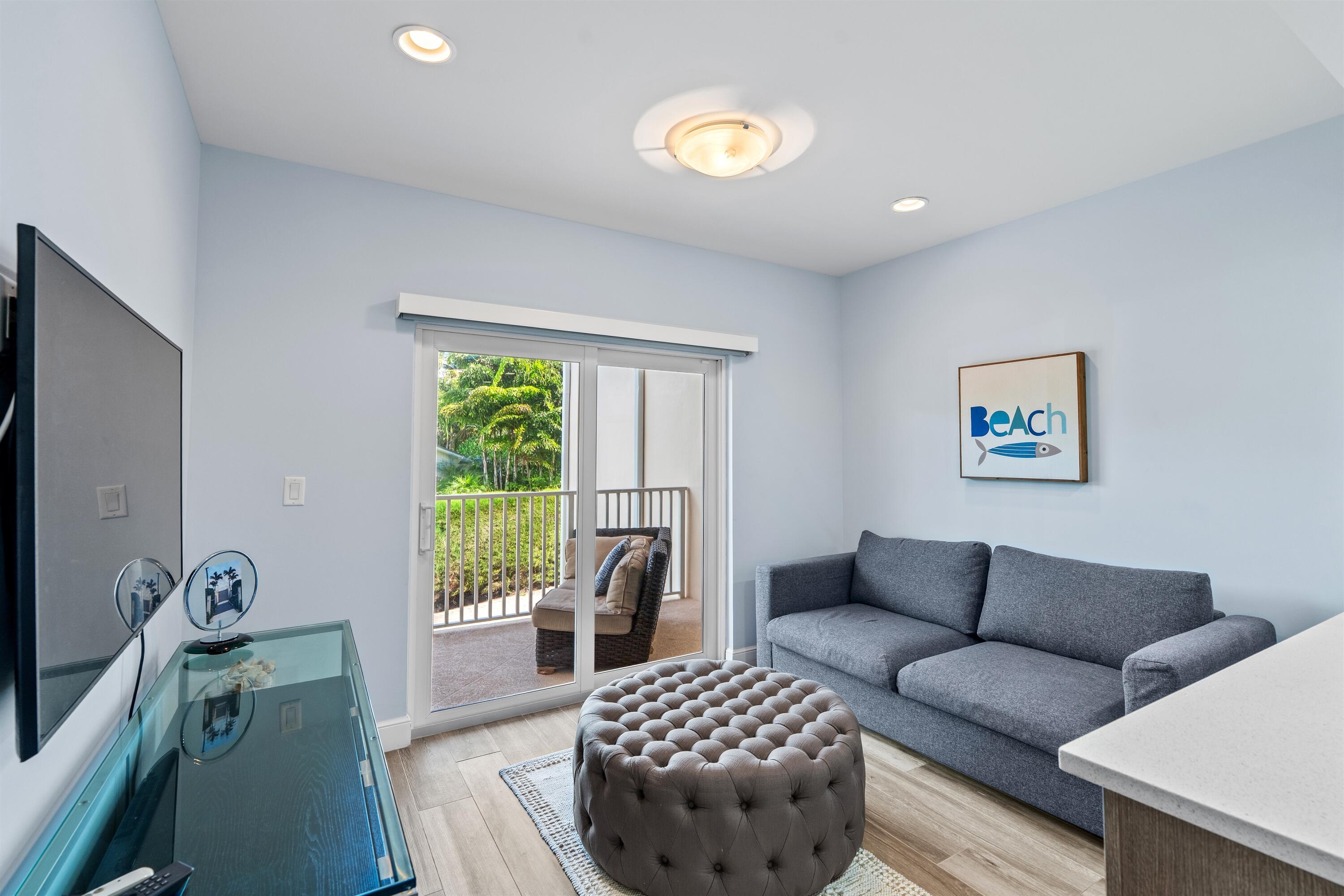 5900 Old Ocean Boulevard, Unit A9 Ocean Ridge, FL 33435 - Photo 8 of 21 FAMILY_ROOM_DT