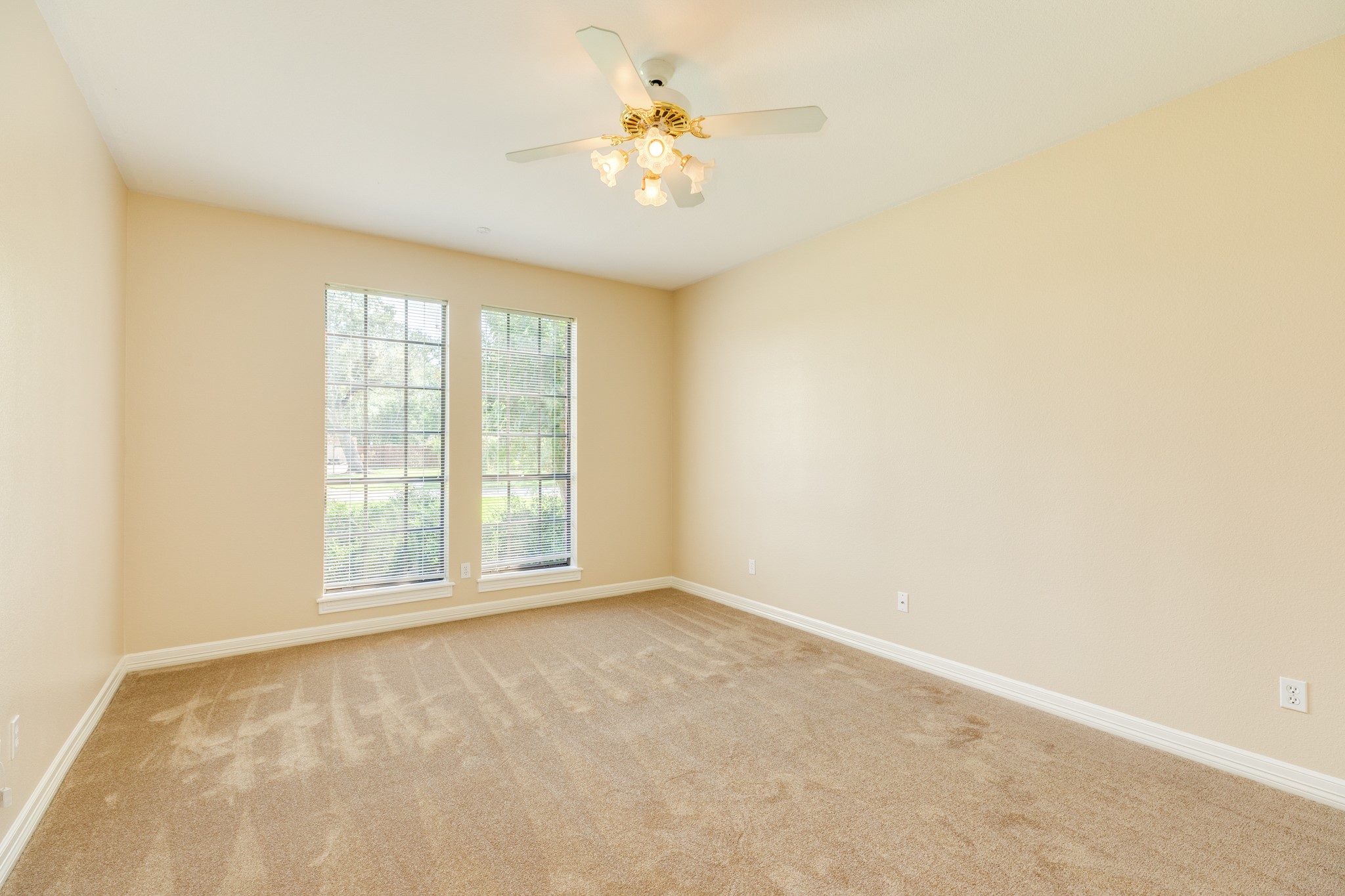 704 Walnut Street Lake Jackson, TX 77566 - Photo 21 of 27 a view of an empty room with a window