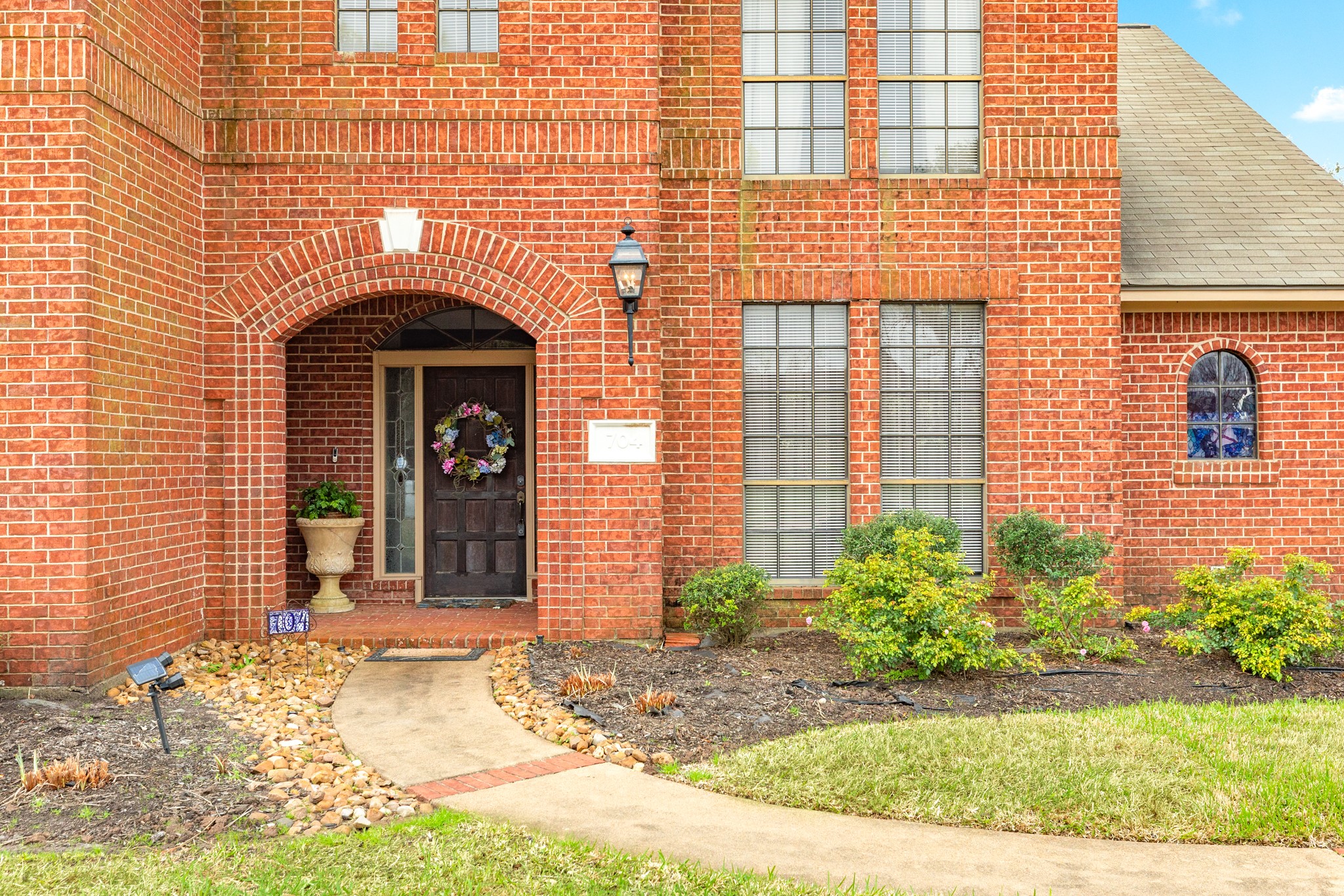 704 Walnut Street Lake Jackson, TX 77566 - Photo 3 of 27 a front view of a house