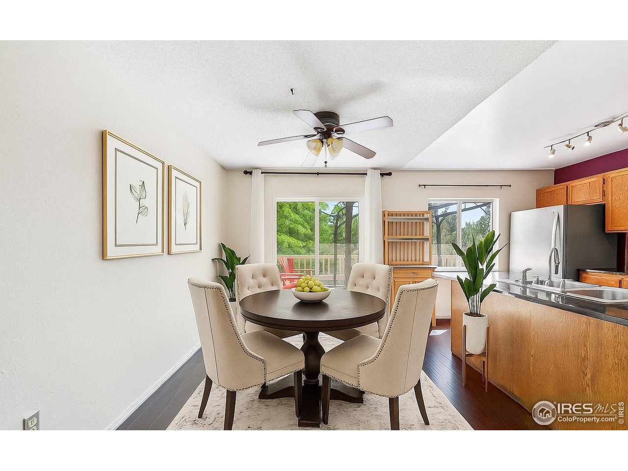 1305 Inverness Drive Lafayette, CO 80026 - Photo 20 of 41 a view of a dining room with furniture window and outside view