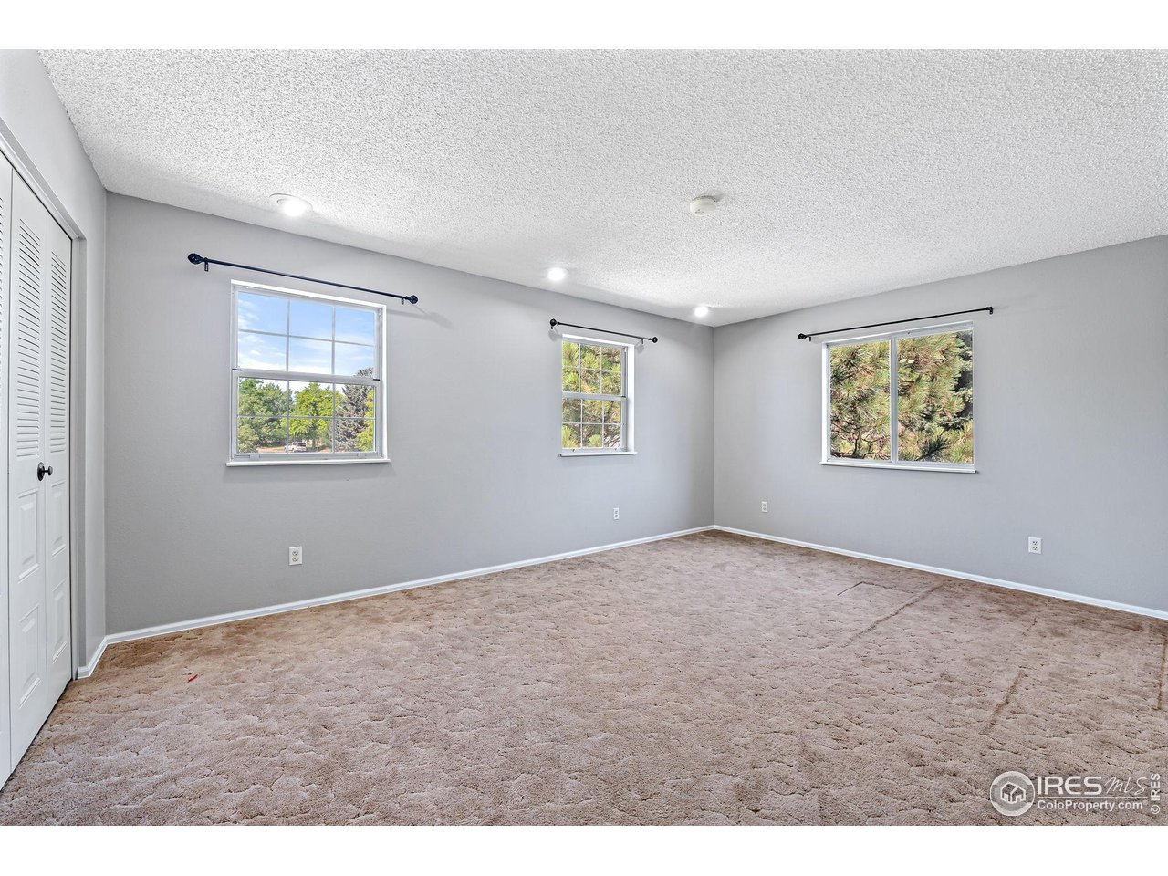 1305 Inverness Drive Lafayette, CO 80026 - Photo 22 of 41 a view of an empty room with a window