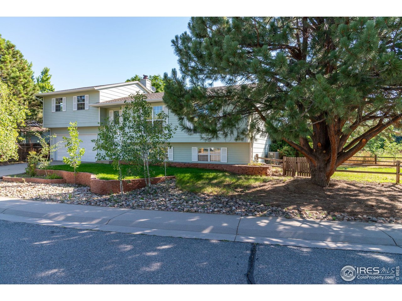 1305 Inverness Drive Lafayette, CO 80026 - Photo 3 of 41 a view of a outdoor space with a house