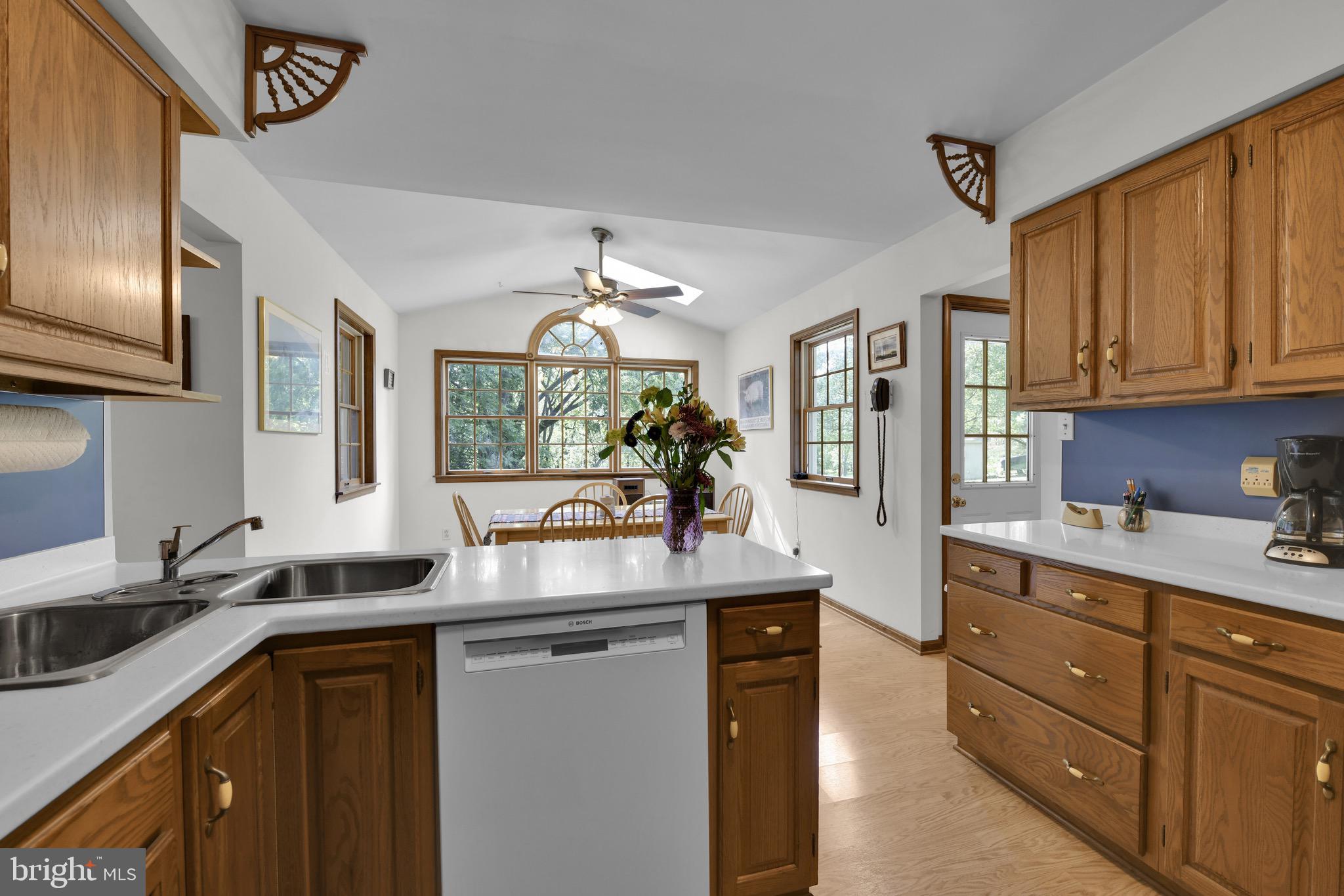 400 Reitnour Road Spring City, PA 19475 - Photo 38 of 52 a kitchen with granite countertop a sink stainless steel appliances and cabinets