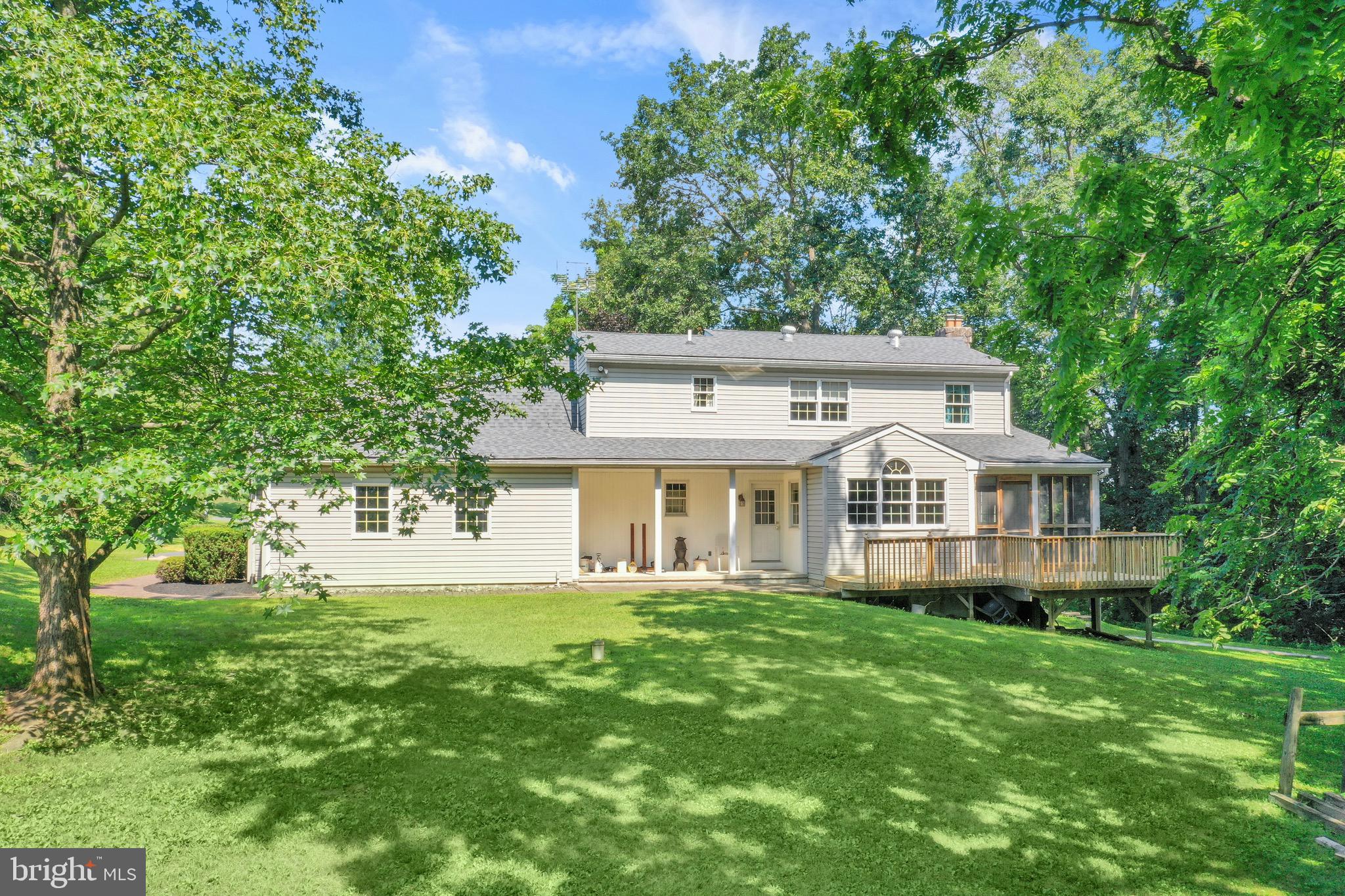 400 Reitnour Road Spring City, PA 19475 - Photo 45 of 52 a front view of a house with a garden and trees