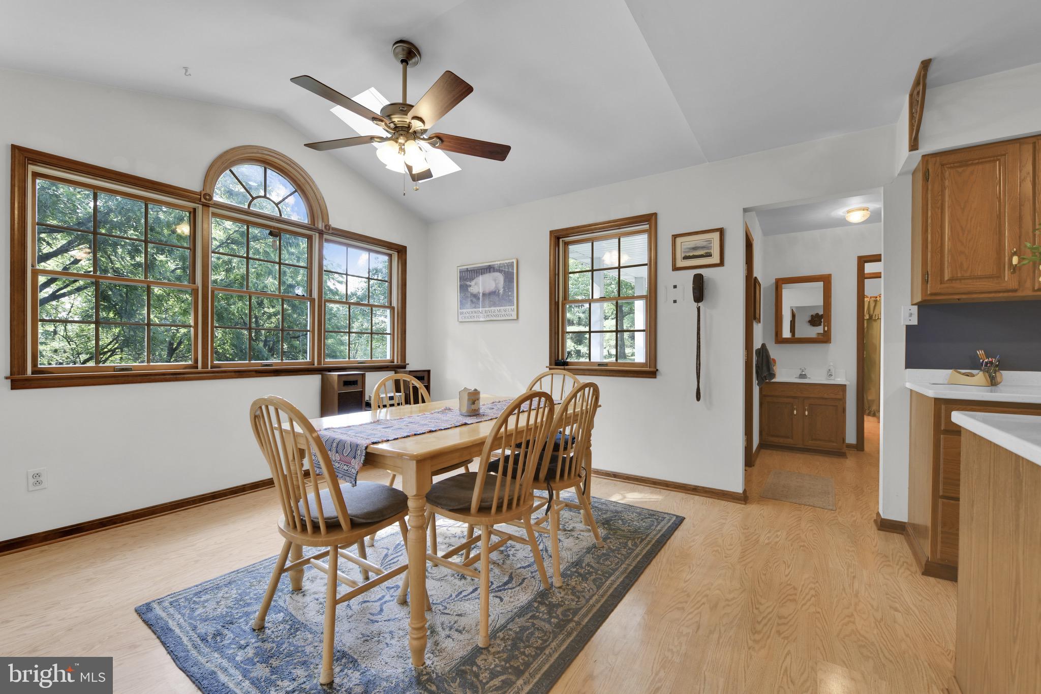 400 Reitnour Road Spring City, PA 19475 - Photo 7 of 52 a view of a dining room with furniture window and wooden floor