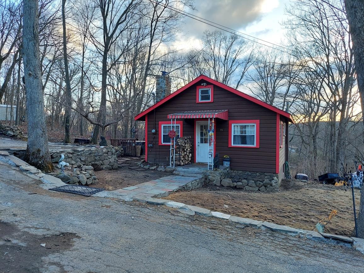 35 Cooper Road Monroe, NY 10950 - Photo 1 of 1 Chalet / cabin featuring a chimney