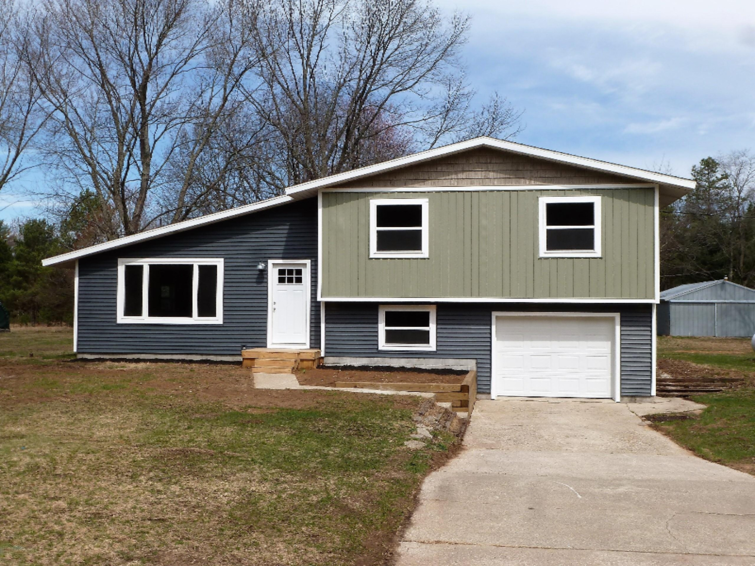 3360 West Riley-Thompson Road Whitehall, MI 49461 - Photo 1 of 33 1-Front