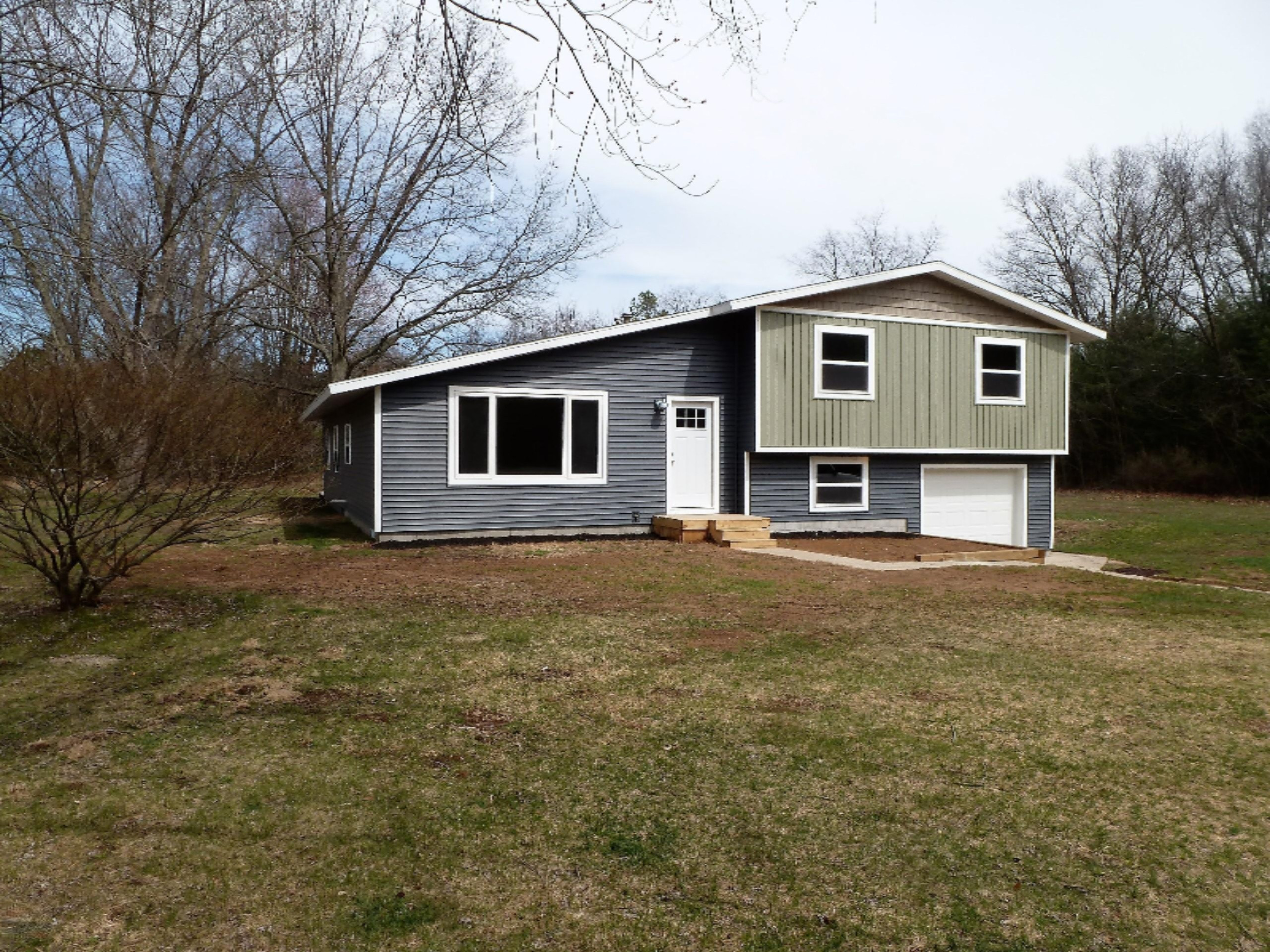 3360 West Riley-Thompson Road Whitehall, MI 49461 - Photo 2 of 33 2-Front