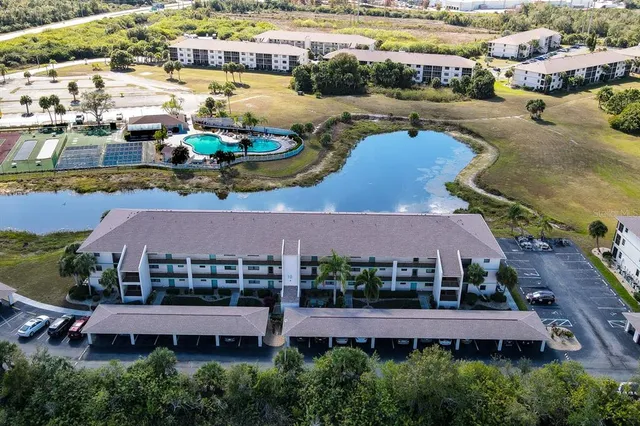 an aerial view of residential houses and outdoor space