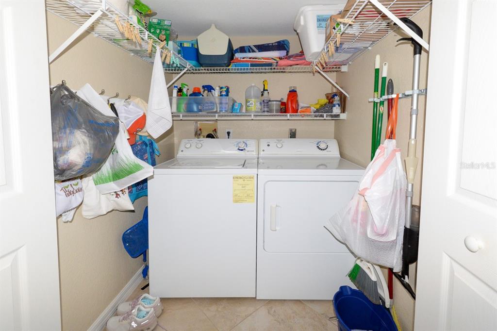 175 Kings Highway, Unit A7 Punta Gorda, FL 33983 - Photo 31 of 36 a utility room with dryer and washer