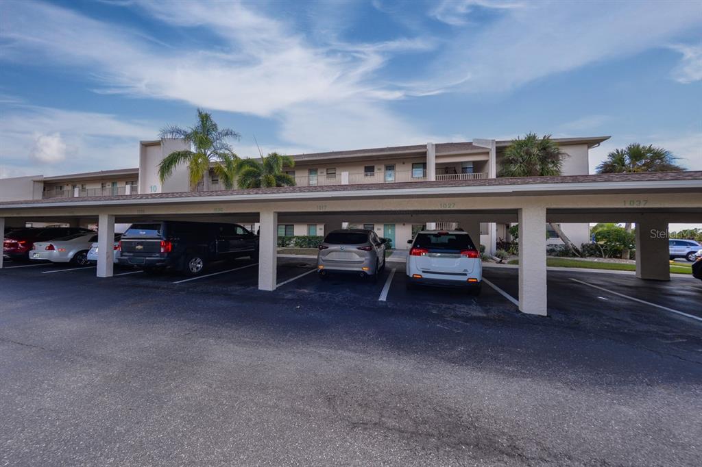 175 Kings Highway, Unit A7 Punta Gorda, FL 33983 - Photo 33 of 36 a view of a parking area