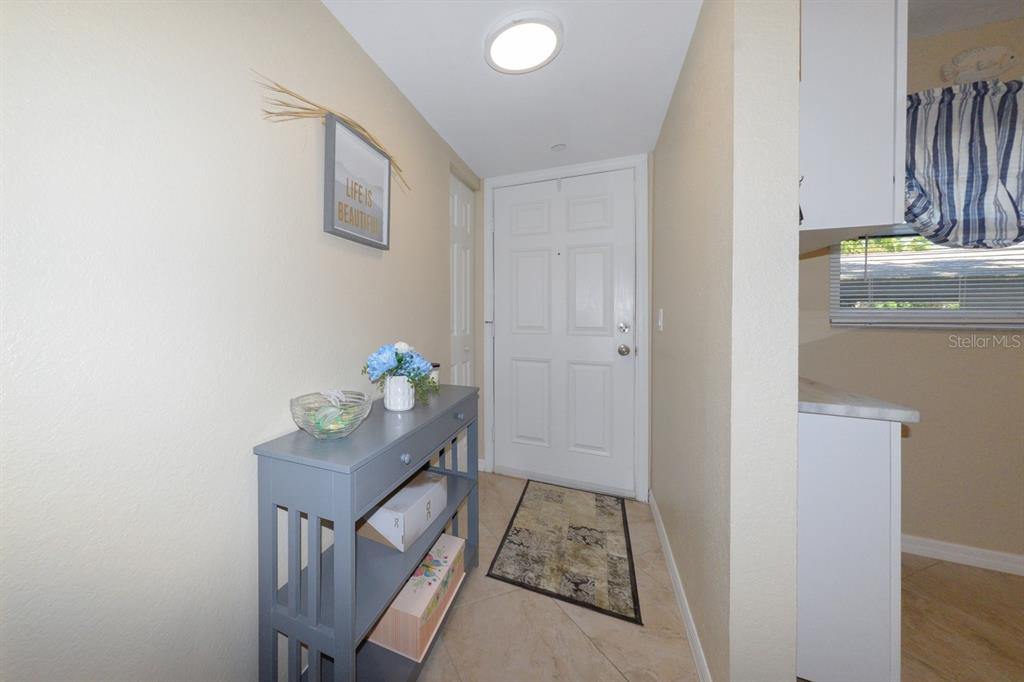 175 Kings Highway, Unit A7 Punta Gorda, FL 33983 - Photo 5 of 36 a room with storage and utility
